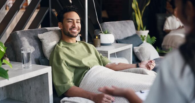 Drip therapy, man and talking to nurse in lounge for IV fluid benefits, infusion progress or checkup. Wellness center, professional or client with intravenous vitamin c for immune boost or assessment