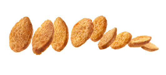 Bread croutons levitate on a white background
