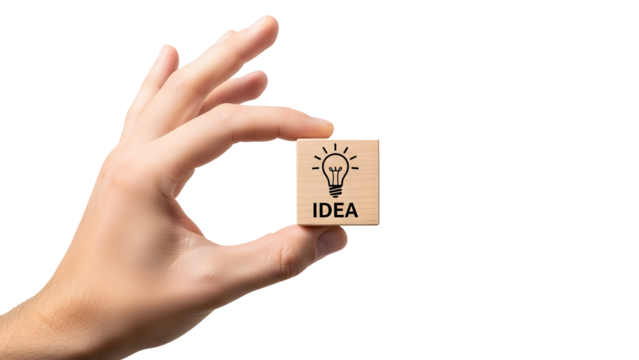 Hand holding a small wooden block featuring a lightbulb icon and the word “IDEA,” symbolizing creativity, innovation, brainstorming, and business inspiration. - Powered by Adobe