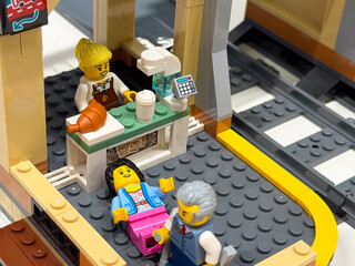 Naklejka premium Colorful lego cafe scene with characters
