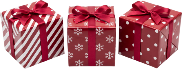 Three Colorful Christmas Gift Boxes with Red Ribbons
