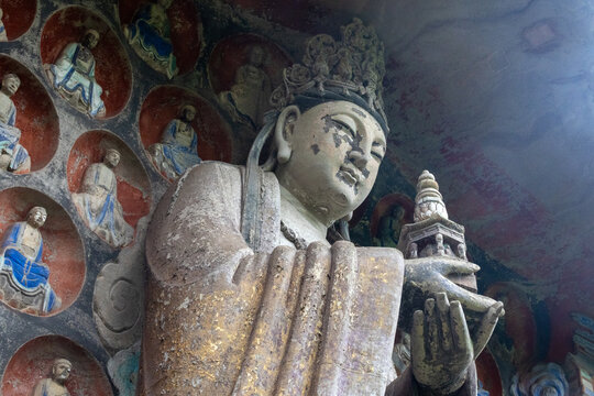 Sculpture of Three Worthies of Huayan located at Dazu Rock Carvings on Mount Baoding, Dazu, China.