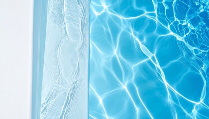 Clear blue swimming pool water with sunlight reflections