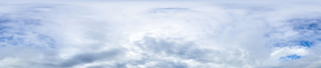 Obraz premium Blue sky panorama with cumulus clouds in seamless spherical equirectangular format as a full zenith for use in 3D graphics, games, and aerial drone photography for sky replacement.