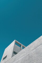 Modern architectural building against a clear blue sky