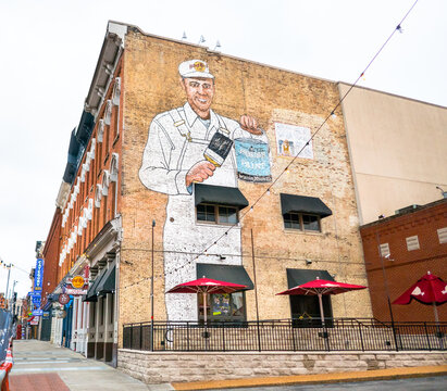 Nashville, TN - USA: Three-story Benjamin Moore mural on the outside brick wall of Hard Rock Cafe