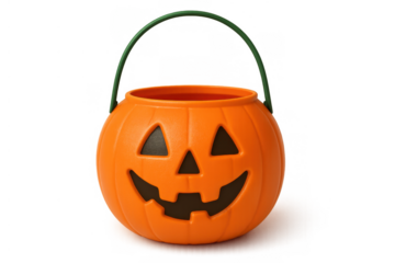 Orange plastic pumpkin candy pail with jack-o'-lantern carved face and green handle for halloween trick-or-treating concept