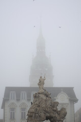 Obraz premium church spire in a fogg