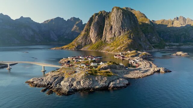 Famous Hamnoy village, Lofoten Islands in Norway. Explore stunning island landscape with mountain views and quiet waters in Norway