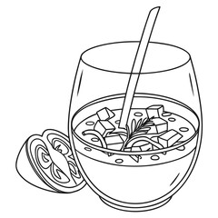 A refreshing chilled soup or gazpacho in a clear glass with a spoon and a slice of tomato and herbs for garnish