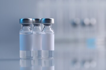 Vaccine in glass vials on mirror surface against blurred grey background, closeup. Space for text