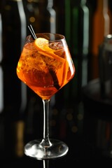 Refreshing spritzer cocktail on table in bar