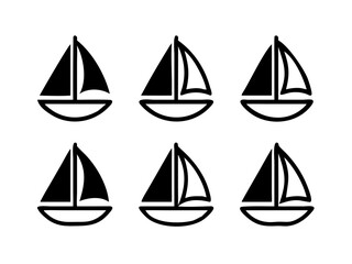 A black and white image of a cat sitting in a box