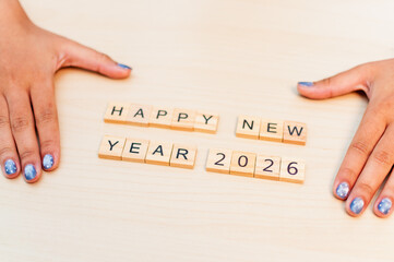 Celebrating new year 2026 with joyful messages home festive close-up new beginnings