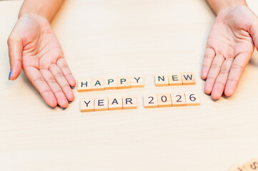 Celebrating new year 2026 joyful greetings home event message festive close-up celebration
