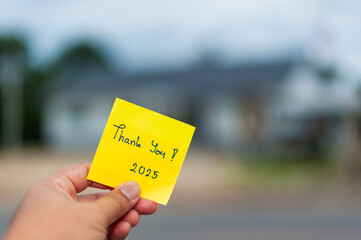 Gratitude note shared with a friend residential area outdoors close-up connection