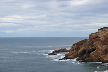 Mossel Bay Southern Cliff Face On Overcast Day Overlooking An Open Ocean Horizon, South Africa