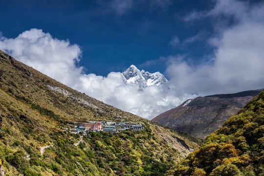 Shomare village on the Dudh koshi river bank against Mt. Lhotse in autumn sunny day. Everest base camp trekking, Khumbu, Nepal.