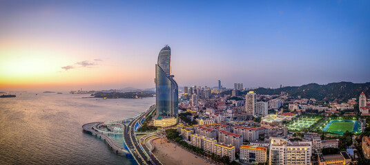 Modern Cityscape at Sunset by the Sea