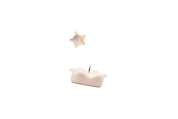 melting wax candle burning with a star shaped flame and small floating stars, no background svg