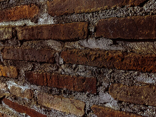 Close-up of Rustic Red Brick Wall with Thick Mortar