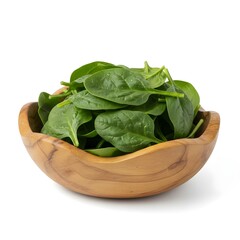 fresh spinach leaves in a wooden bowl