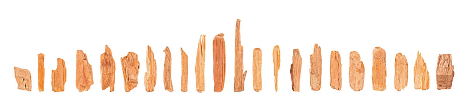 Wooden chips sawdust isolated on a white background, top view. Set of wood chips for smoking. Ecological fuel.