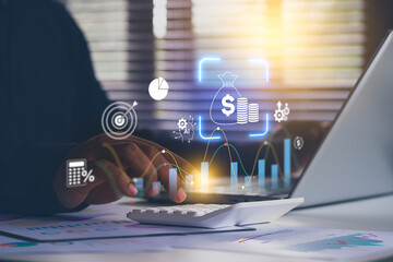 Businessman using calculator to calculate numbers of statistic business profits growth rate on documents graph data, Business investment, financial data showing growth charts, AI assistant analytics