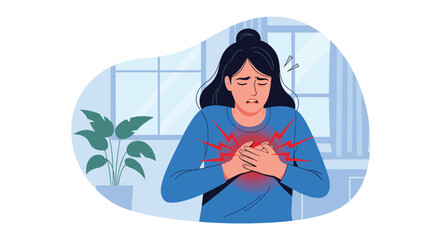 Woman clutches her chest in a painful radiating chest pain moment as distress and worry rise and she seeks urgent help indoors in a quiet room.