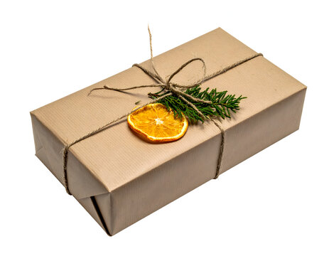 A rectangular parcel wrapped in brown wrapping paper and tied with string white isolated generative AI
