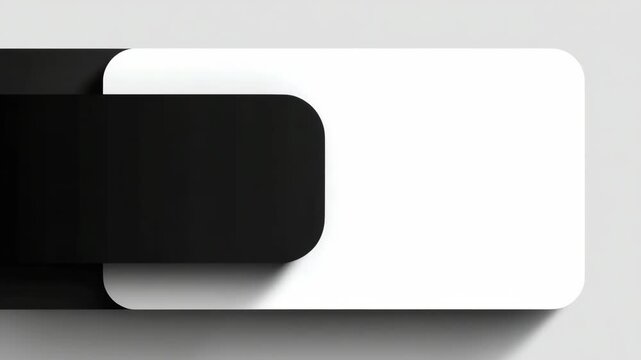 Abstract black and white overlapping rounded rectangles on light background, showcasing modern minimalism and geometric balance