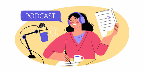 A woman records a podcast with a microphone notes and headphones