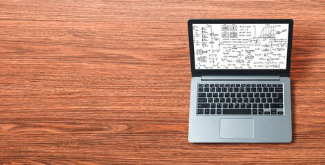 Mathematic equations and modish formula on computer screen showing concept of science and education