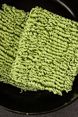 Jade noodles raw green noodles healthy food main course ingredient appetizer fresh delicious gourmet food table setting rustic food top view copy space