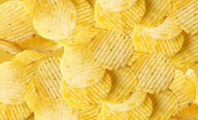 Corrugated chips wallpaper textured background, wavy potato chips pattern, crispy snack template