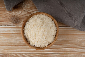 Raw flattened rice. Dry rice flakes or poha, Indian breakfast food