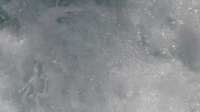 Fresh carbonated bubbles fizzing in clear sparkling water