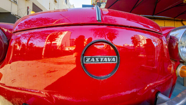 Vintage red Zastava 750, a classic Serbian-produced compact car, showcasing retro automotive design and historical character in Durres, Albania 11.12.2025 