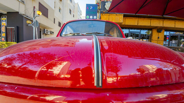 Vintage red Zastava 750, a classic Serbian-produced compact car, showcasing retro automotive design and historical character in Durres, Albania 11.12.2025 