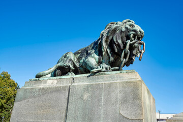 Bronze lion sculpture at the Monument of Liberty