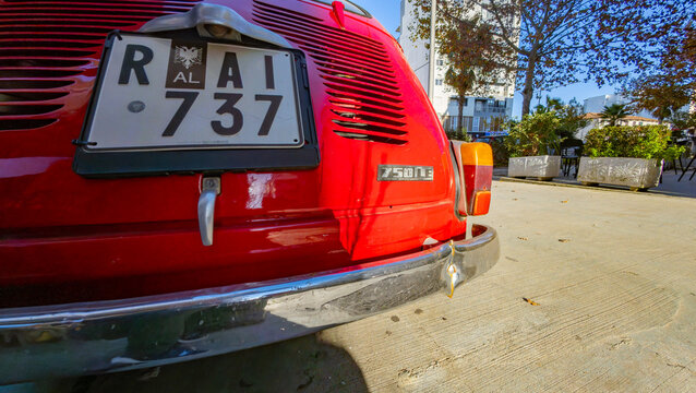 Vintage red Zastava 750, a classic Serbian-produced compact car, showcasing retro automotive design and historical character in Durres, Albania 11.12.2025 