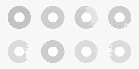 Arrangement of grayscale circular shapes with varying degrees of fill