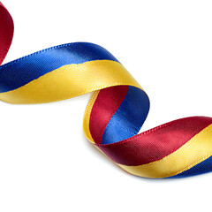 Graceful twisted ribbon in vibrant blue, yellow, and red hues for festive design