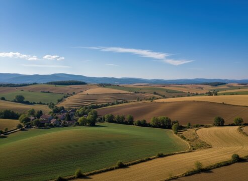 Expansive Countryside Landscape with Rolling Hills and Fields