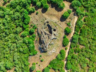 Aerial view of Nuraghe Cuccurada in Mogoro. Sardinia, Italy