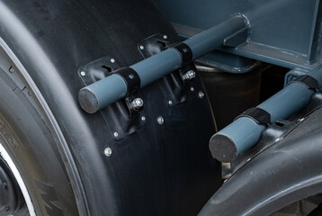 Semi-trailer, truck spare parts. Tubes, various fasteners and auto electronics. View on truck chassis frame equipment. Truck back parts details devices. Truck MOT maintenance repair.