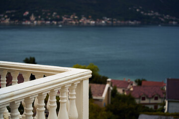 Fototapeta premium Peaceful sea view from white railing