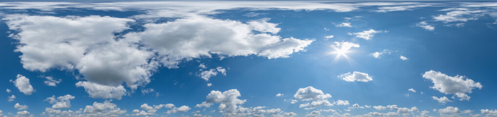 Seamless cloudy blue sky hdri panorama 360 degrees angle view with zenith and beautiful clouds for use in 3d graphics or game development as sky dome or edit drone shot