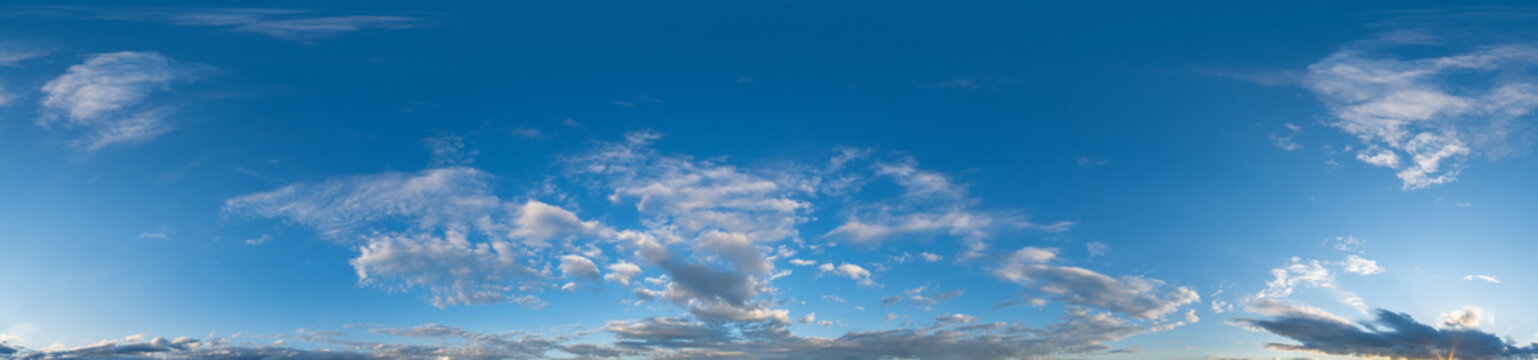 blue sky hdri 360 panorama with white beautiful clouds in seamless projection with zenith for use in 3d graphics or game development as sky dome or edit drone shot for sky replacement