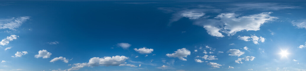 blue sky hdri 360 panorama with white beautiful clouds in seamless projection with zenith for use in 3d graphics or game development as sky dome or edit drone shot for sky replacement © NastyaPhoto